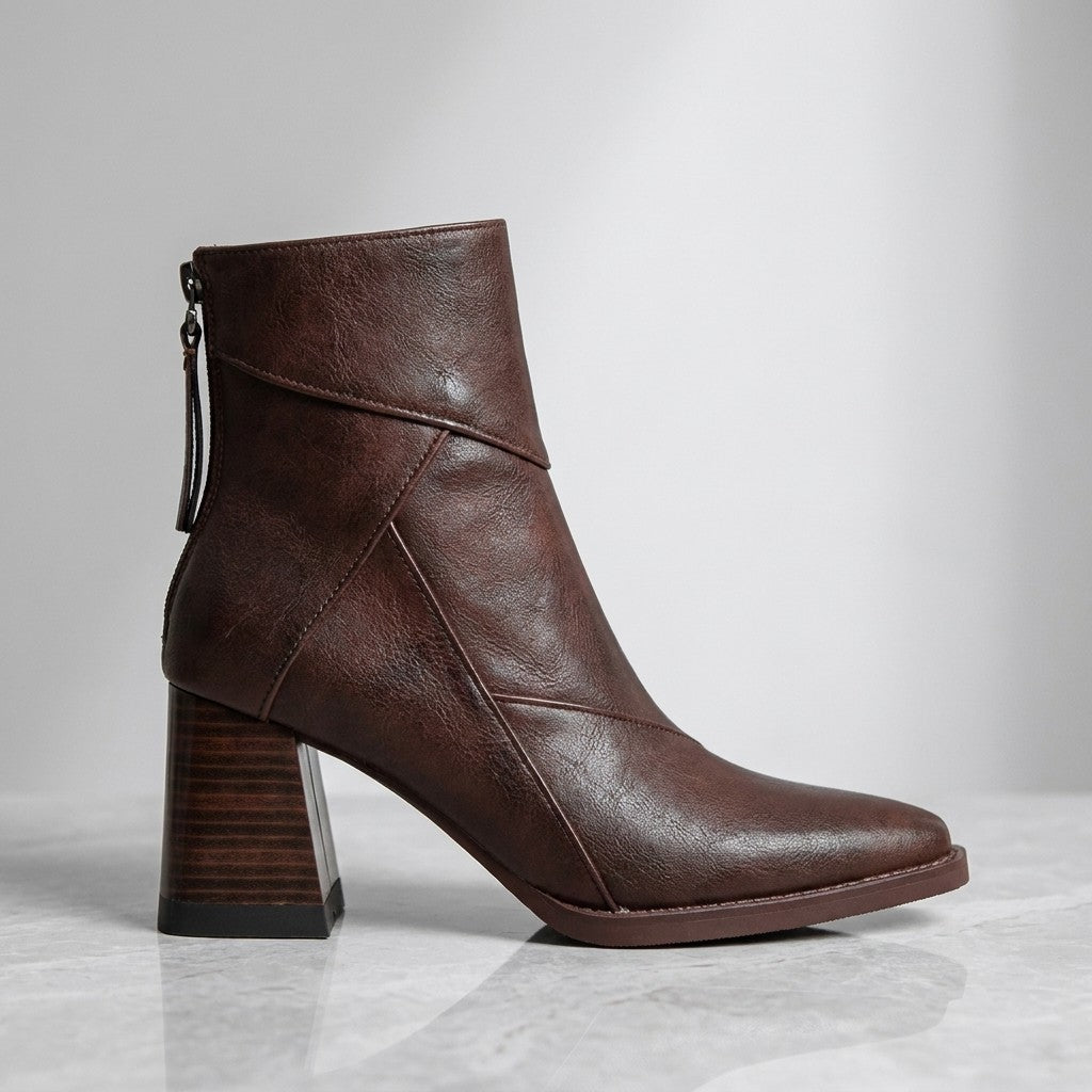 Tropea Paneled Ankle Boots — Brown, single boot in side profile on light grey marble