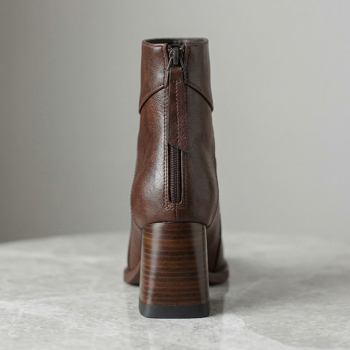Tropea Paneled Ankle Boots — Brown, close-up from behind of the centered back zip and stacked block heel