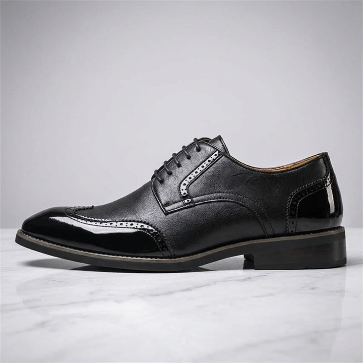Urbino Leather Wingtip Brogues — Black, side profile studio view