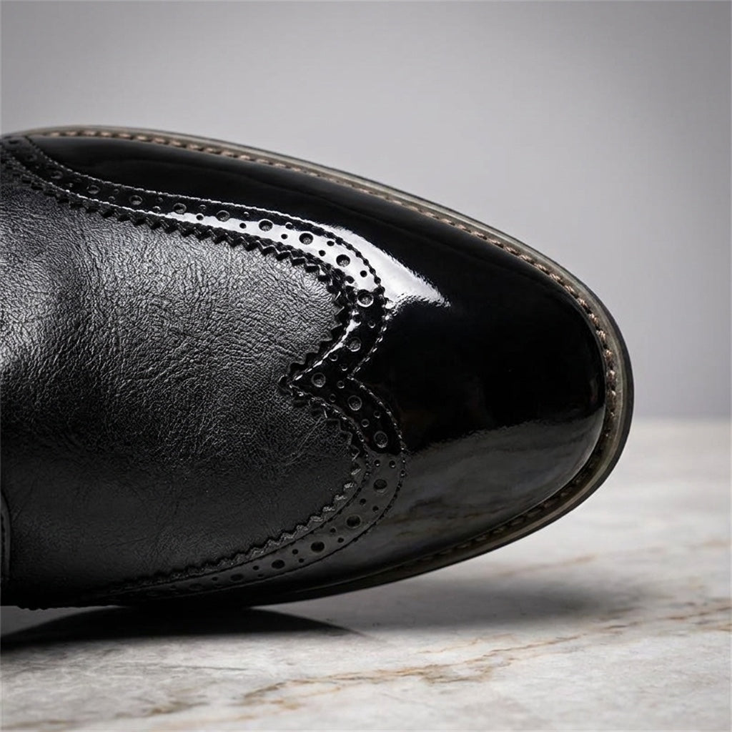Urbino Leather Wingtip Brogues — Black, close view of the gloss and matte seam