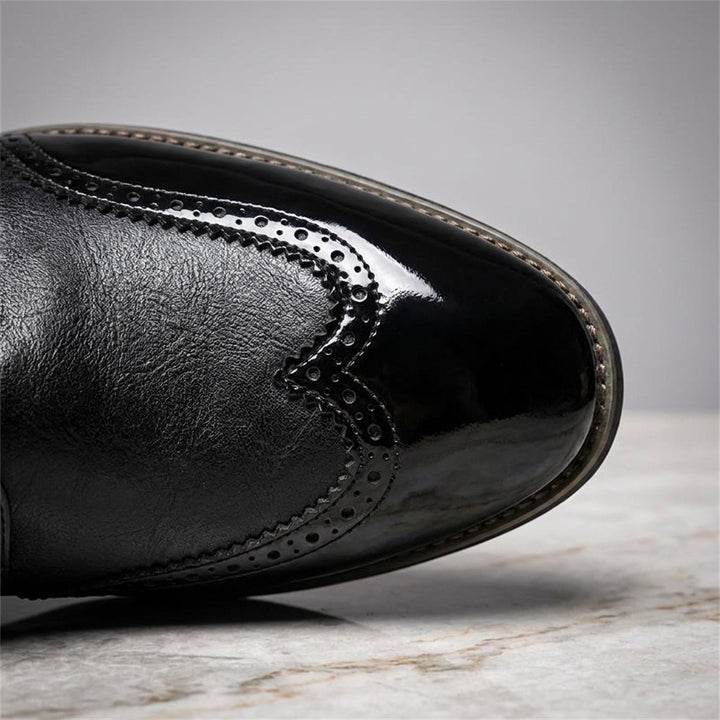 Urbino Leather Wingtip Brogues — Black, close view of the gloss and matte seam