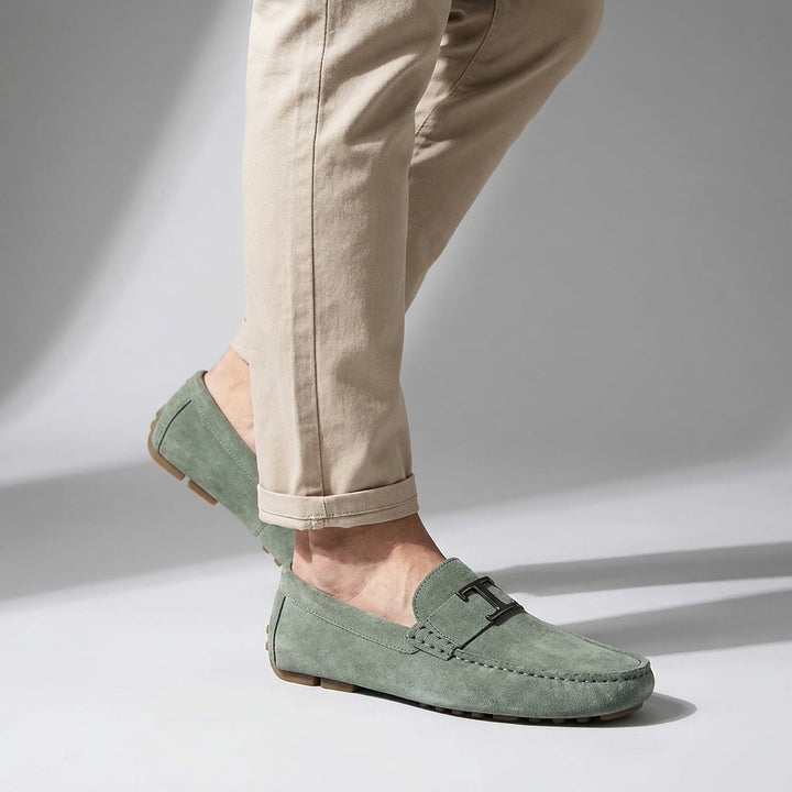 Recco Suede Loafers — Green, male model knee-down studio