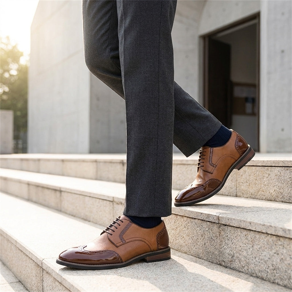 Urbino Leather Wingtip Brogues — Cognac, worn on stone steps