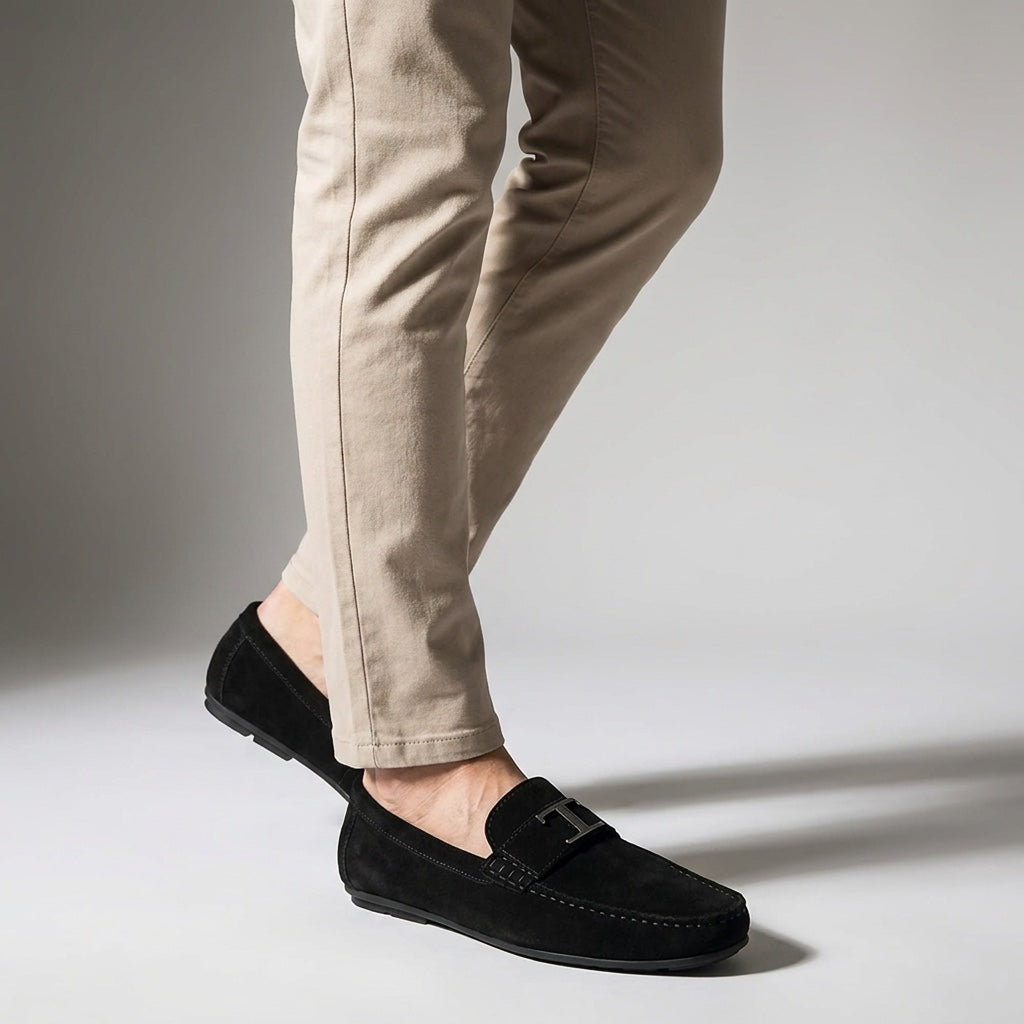 Recco Suede Loafers — Black, male model knee-down studio