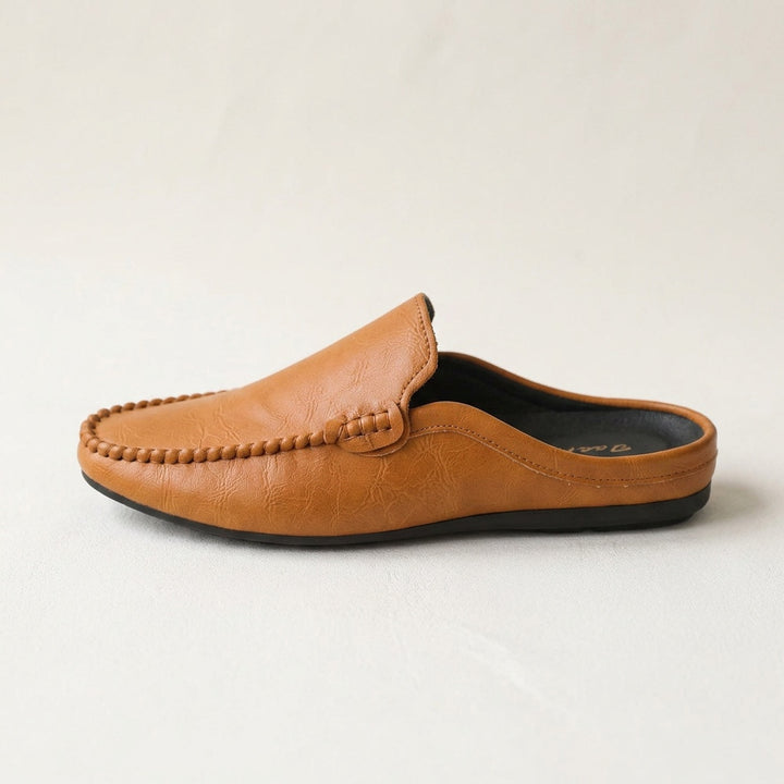 Cetara Leather Mules — Tan, side profile studio view