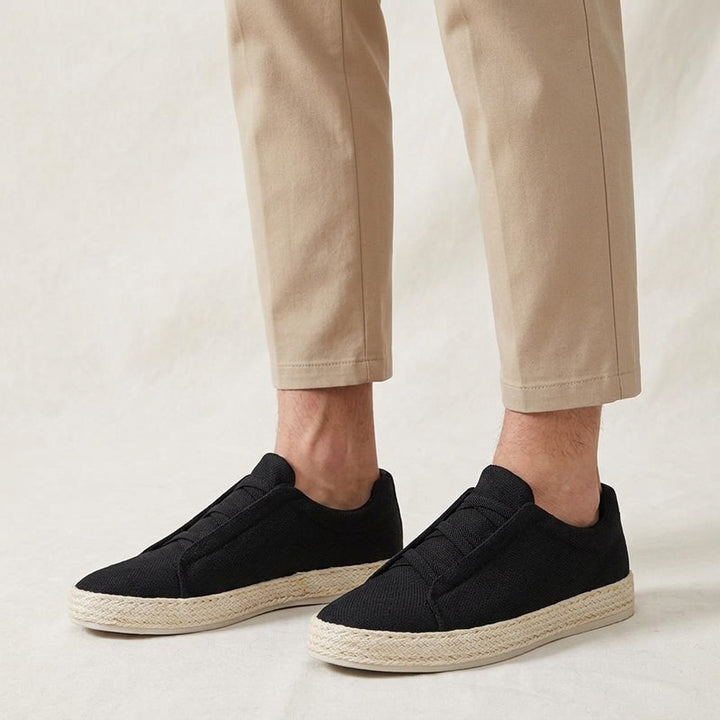 Ponza Espadrille Sneakers — Black, worn with beige chinos, studio