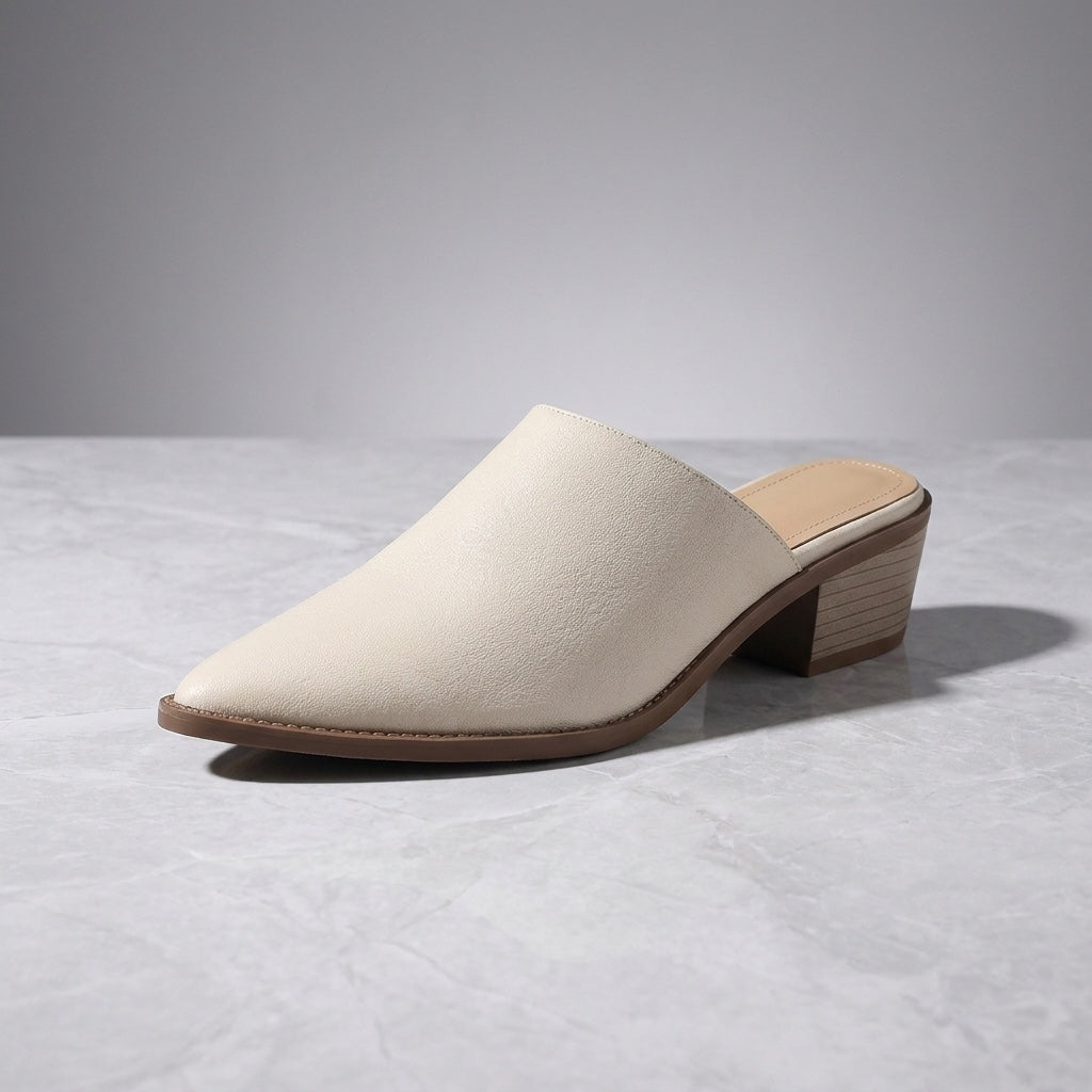 Sabina Leather Mules — Cream, three-quarter studio view