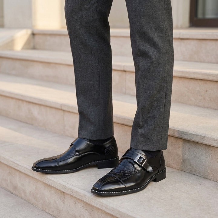 Arezzo Monk Straps — Black, worn on stone steps outside a venue