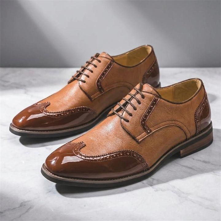 Urbino Leather Wingtip Brogues — Cognac, three-quarter studio view of the pair