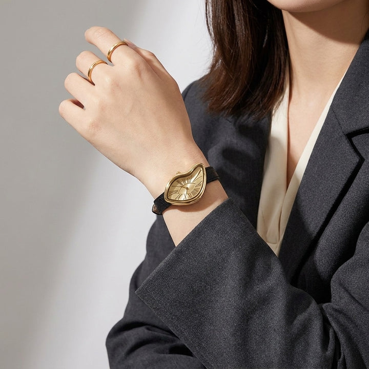 Navona Twisted Watch — Black Gold, worn on the wrist in the studio