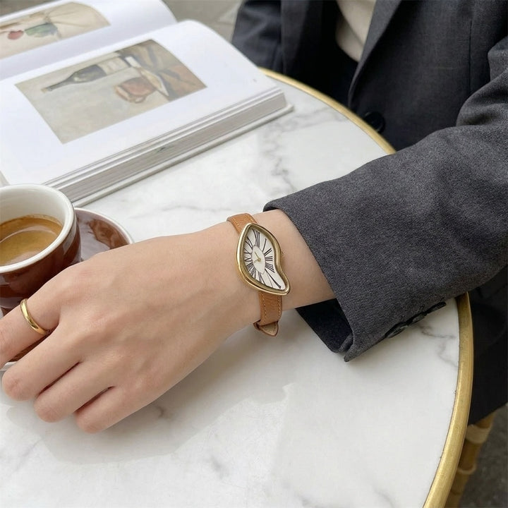 Navona Twisted Watch — Tan, worn at a cafe table