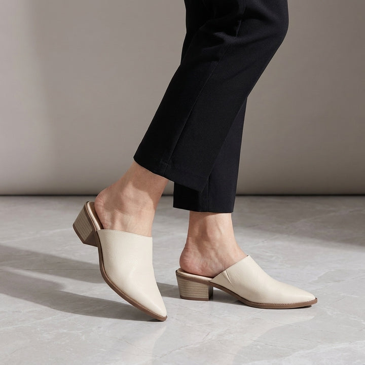 Sabina Leather Mules — Cream, worn, studio view from the knee down