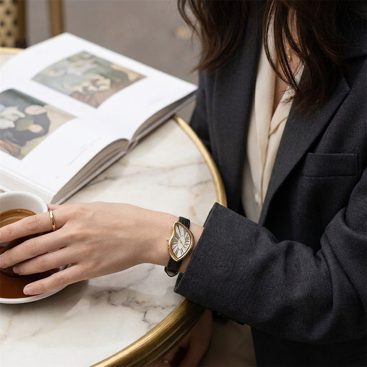 Navona Twisted Watch — Black Ivory, worn at a cafe table