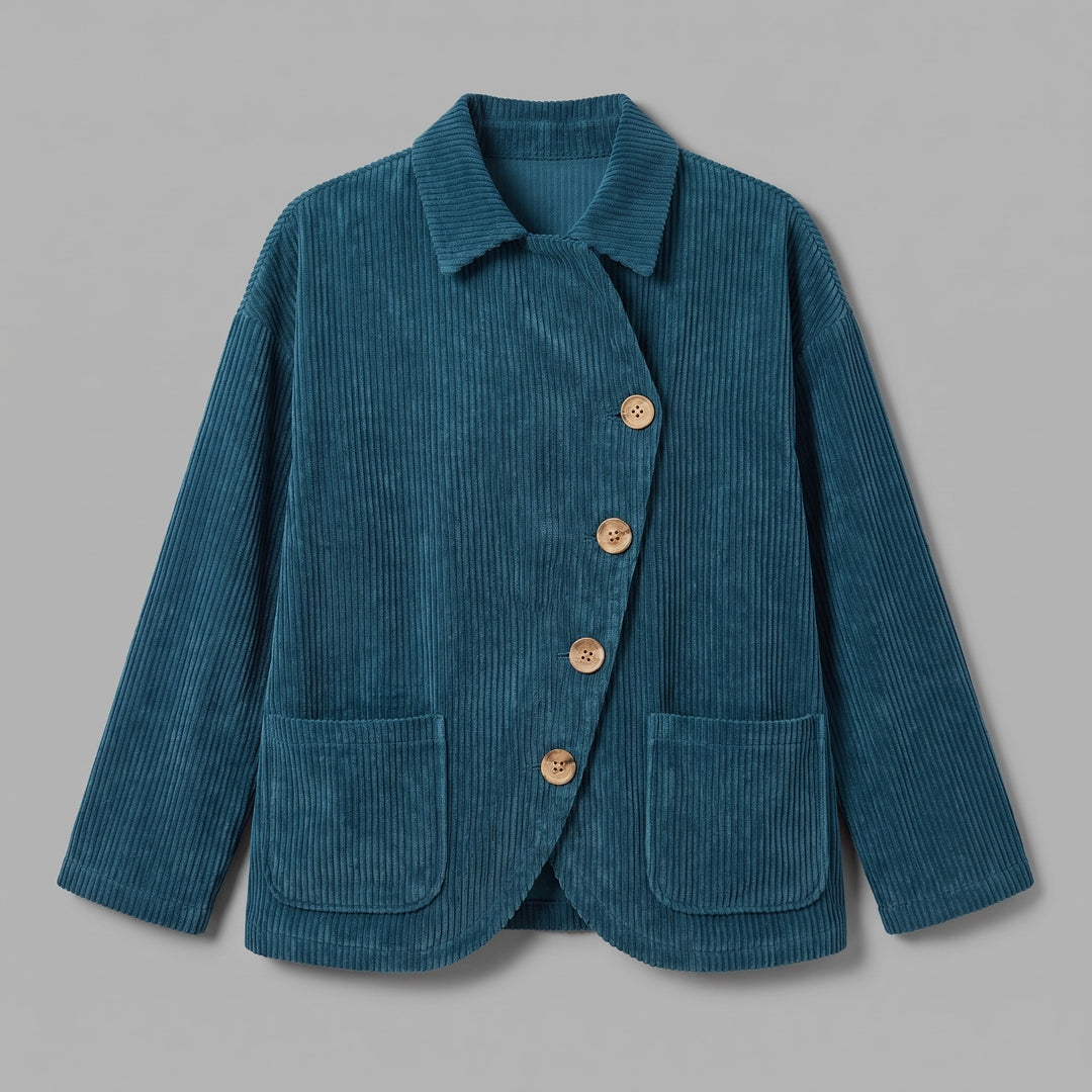 Asiago Corduroy Jacket — Blue, jacket laid flat from the front on a grey seamless background, showing the single diagonal row of four buttons, turn-down collar and two lower patch pockets