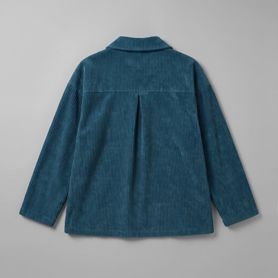 Asiago Corduroy Jacket — Blue, jacket laid flat from the back on a grey seamless background, showing the back yoke and centre pleat