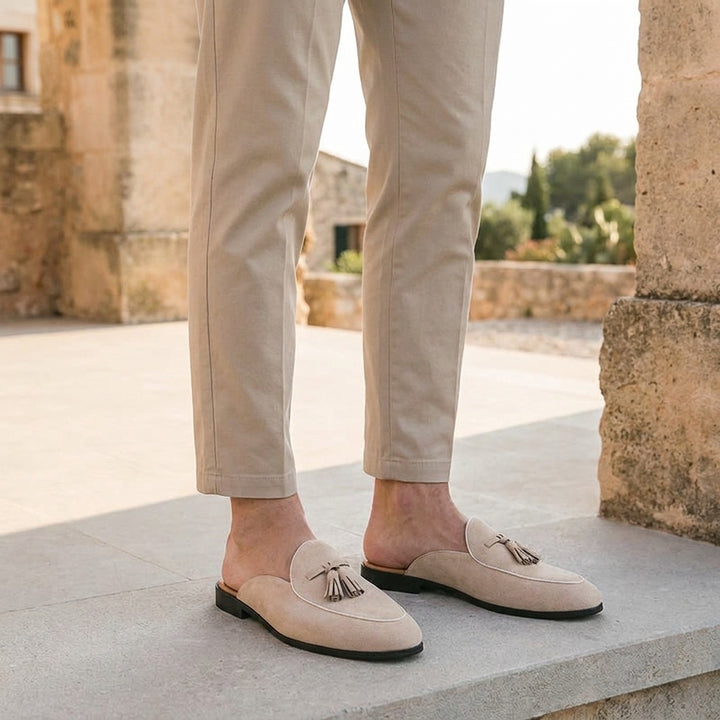 Fasano Suede Mules — Beige, male model knee-down coastal steps