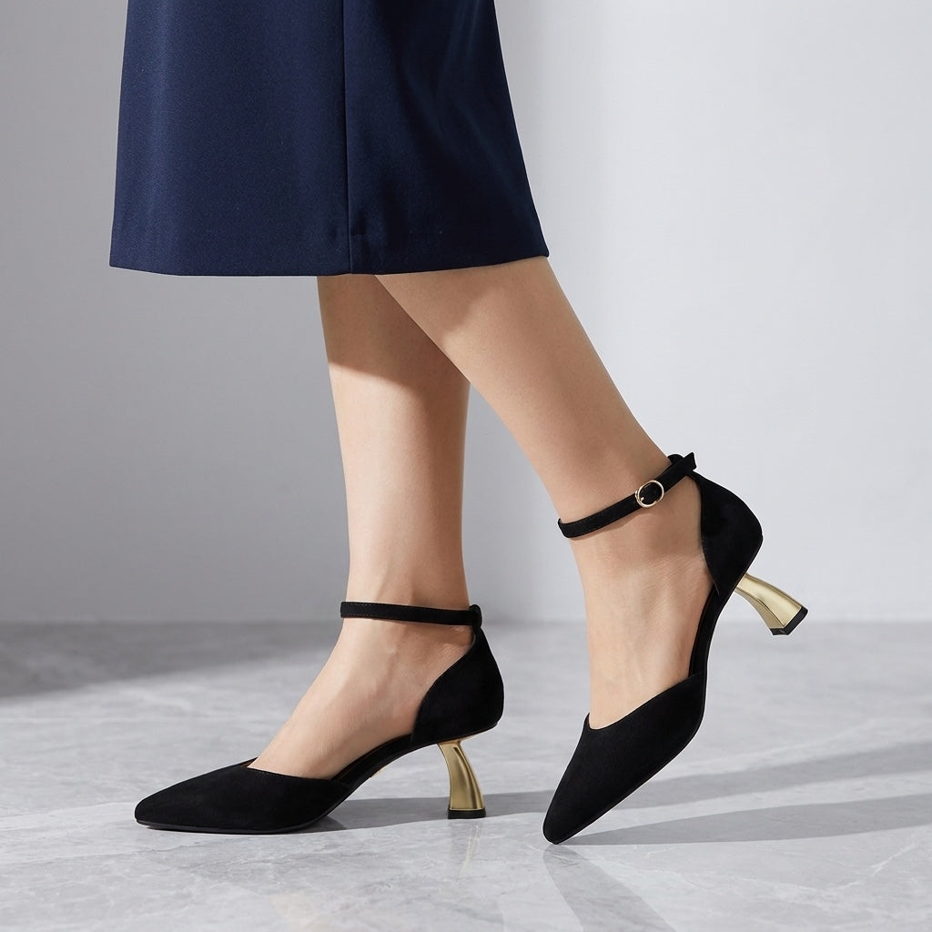 Tremezzo Ankle-Strap Pumps — Black, worn, studio view from the knee down
