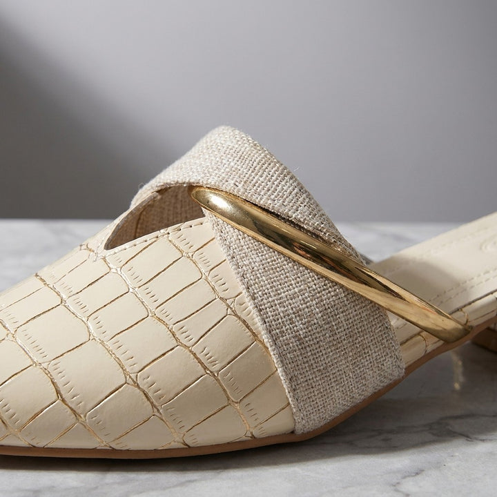 Orvieto Croc-Embossed Mules — Beige, construction close-up