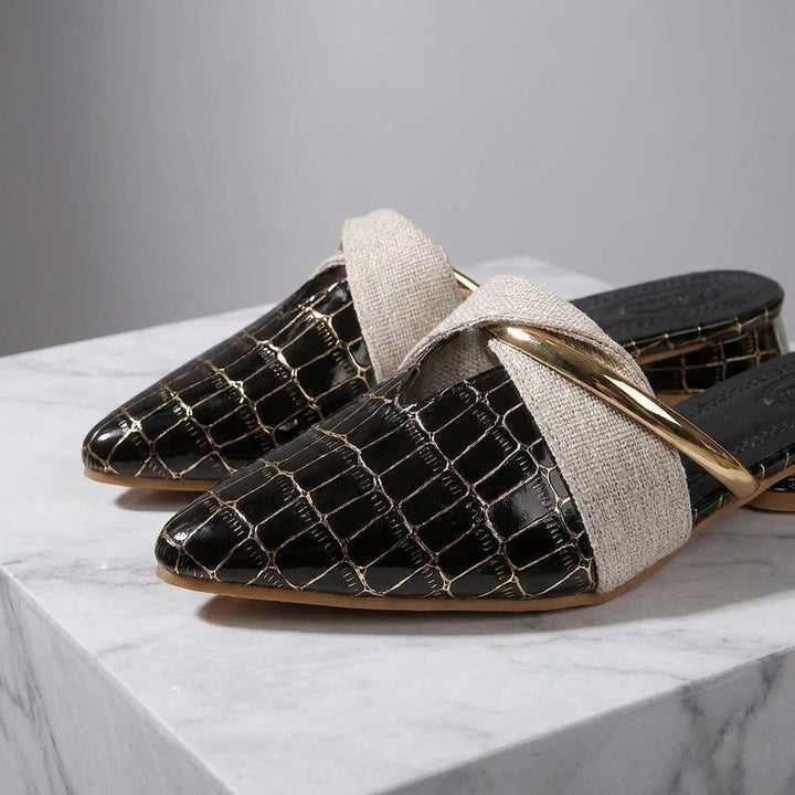 Orvieto Croc-Embossed Mules — Black, construction close-up