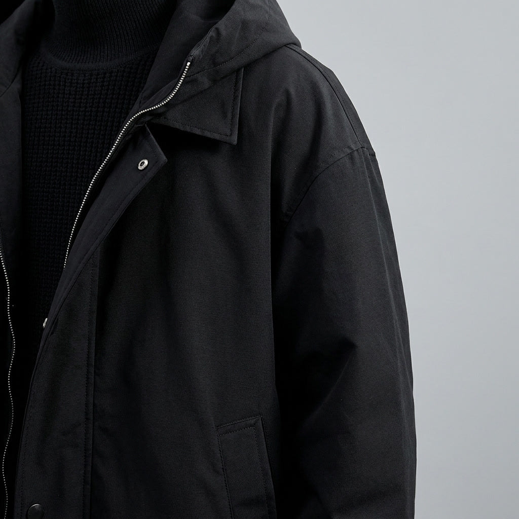Kensington Overcoat — Black, studio construction detail