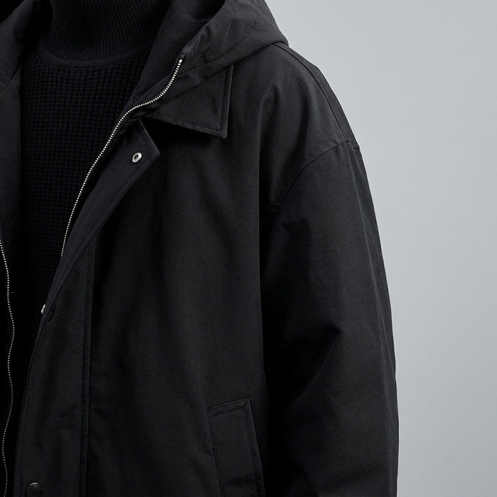 Kensington Overcoat — Black, studio construction detail