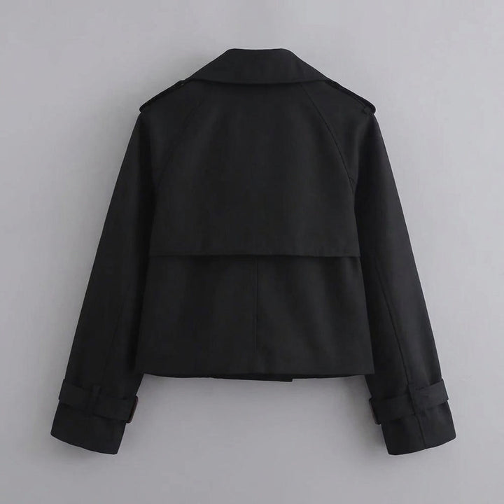 Chiavari Cropped Trench — Black, flat lay back on grey seamless