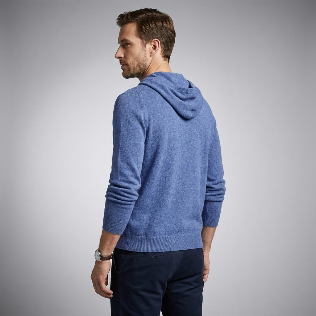 Nomad Merino Wool Hoodie — Blue, three-quarter back on millennial model