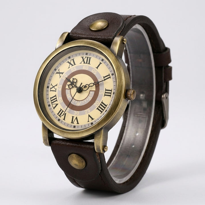 Sabaudia Vintage Watch — Bronze / Dark Brown, cream Roman-numeral dial on a light-grey studio backdrop