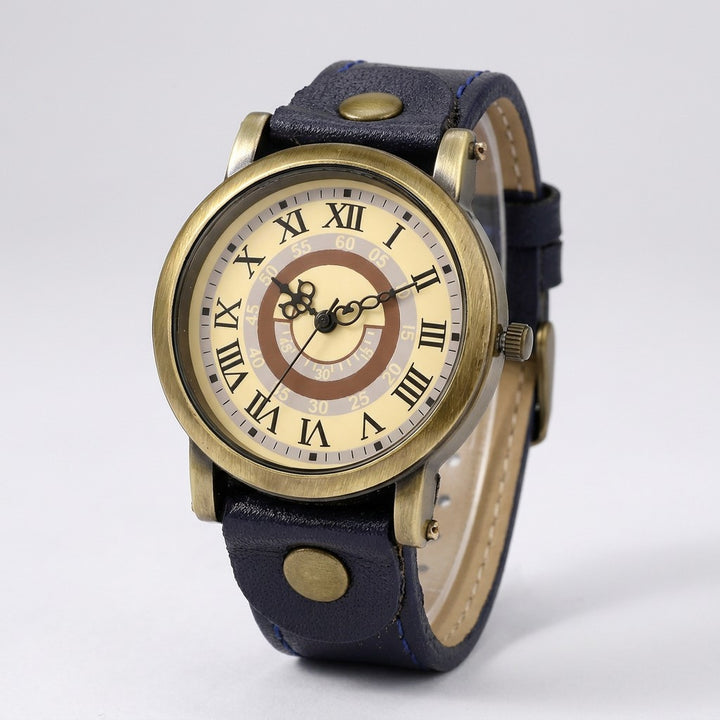 Sabaudia Vintage Watch — Bronze / Navy, cream Roman-numeral dial on a light-grey studio backdrop