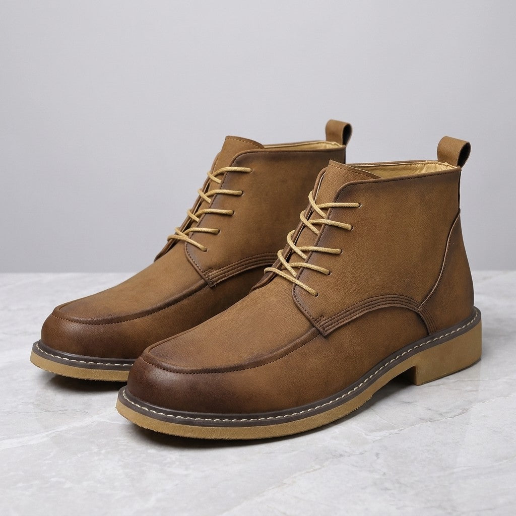 Trento Leather Boots — Brown, pair on marble