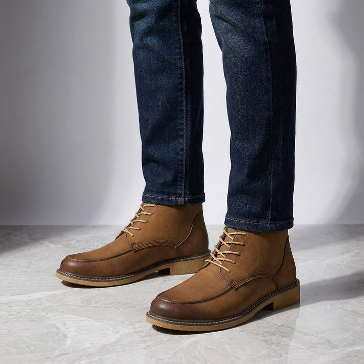 Trento Leather Boots — Brown, on model knee-down studio
