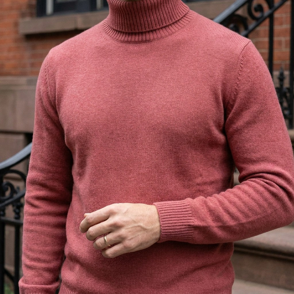 Cesena Merino Wool Turtleneck — Coral Red, worn close-up of the cuff and knit