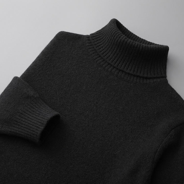 Cesena Merino Wool Turtleneck — Black, close-up of the ribbed collar, knit and cuff