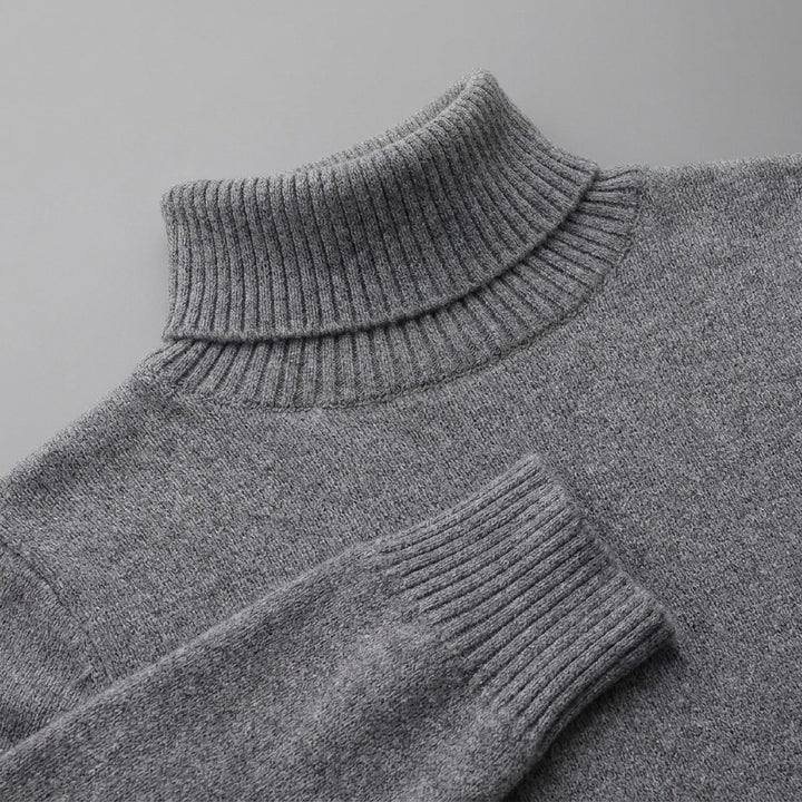 Cesena Merino Wool Turtleneck — Charcoal, close-up of the ribbed collar, knit and cuff