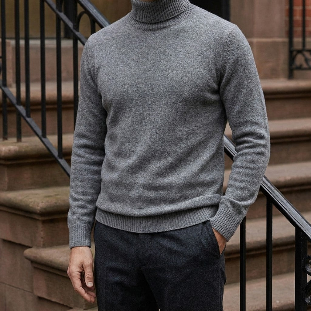 Cesena Merino Wool Turtleneck — Charcoal, worn on a brownstone stoop