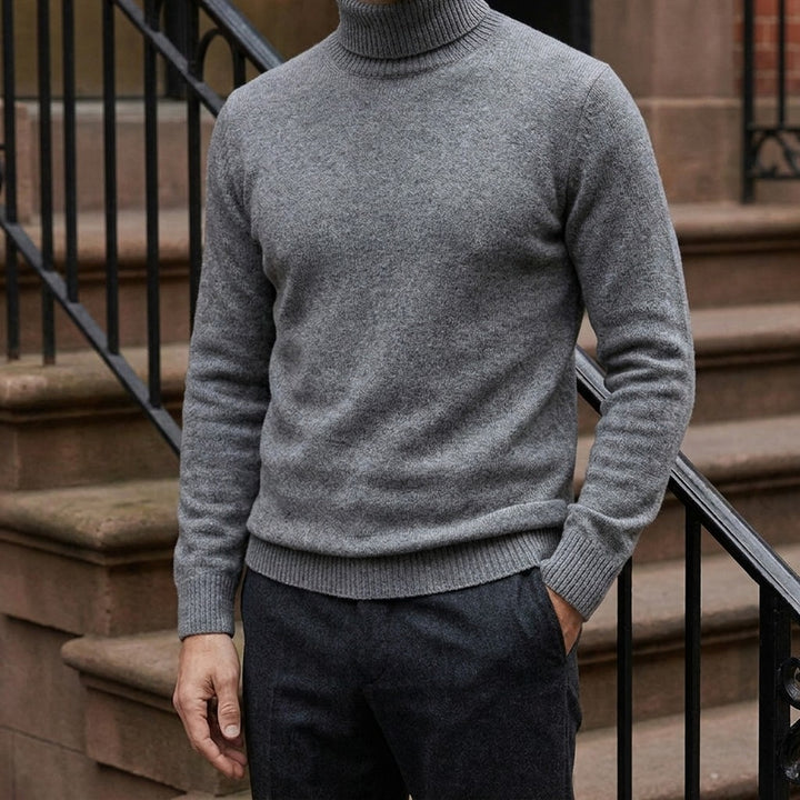 Cesena Merino Wool Turtleneck — Charcoal, worn on a brownstone stoop