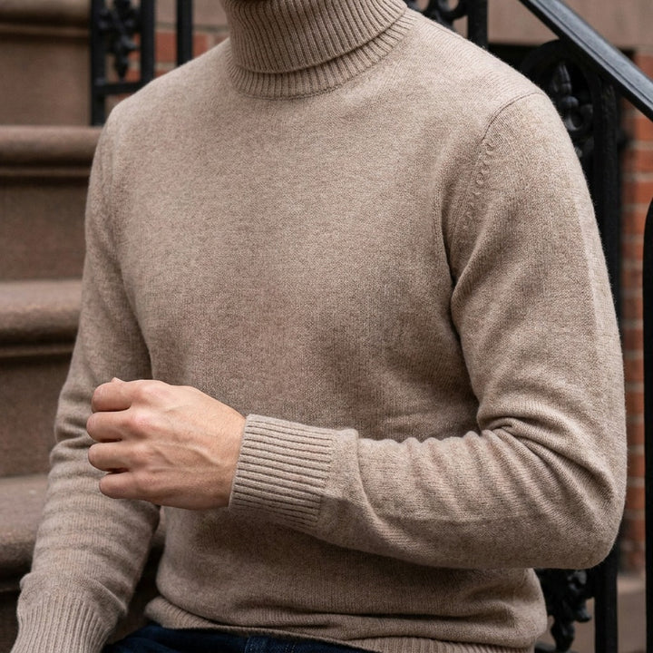 Cesena Merino Wool Turtleneck — Camel, worn close-up of the cuff and knit