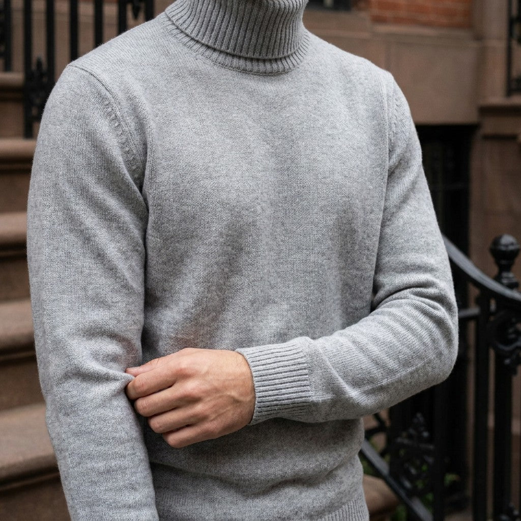 Cesena Merino Wool Turtleneck — Light Grey, worn close-up of the cuff and knit