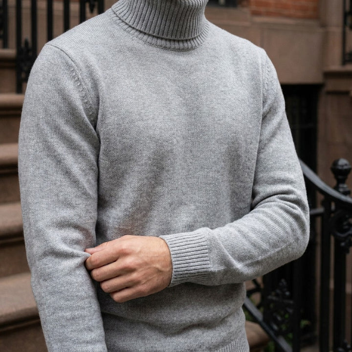Cesena Merino Wool Turtleneck — Light Grey, worn close-up of the cuff and knit