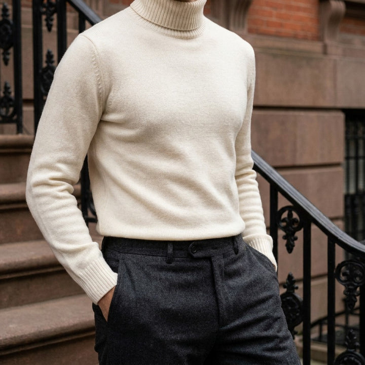 Cesena Merino Wool Turtleneck — Cream, worn on a brownstone stoop
