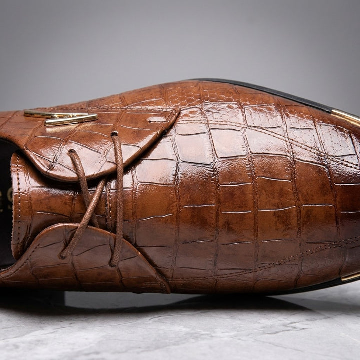 Cingoli Embossed Dress Shoes — Brown, close-up of croc-embossed vamp, laces and gold V accent