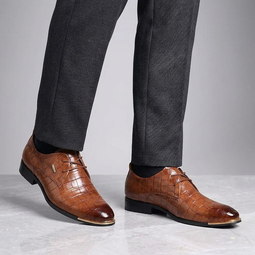 Cingoli Embossed Dress Shoes — Brown, worn by a man, knee-down studio