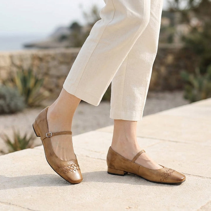 Verona Mary Janes — Tan, worn outdoors on a stone terrace, from the knee down