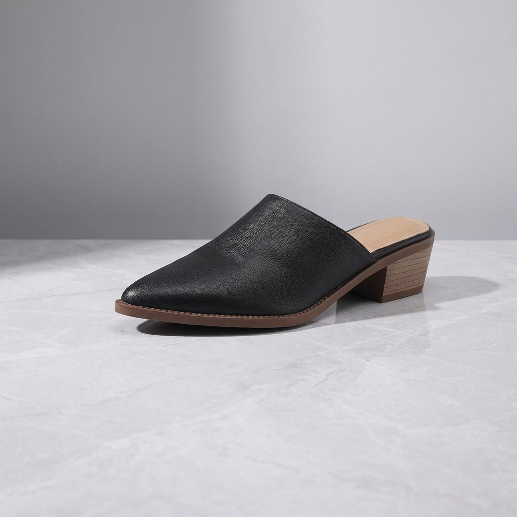 Sabina Leather Mules — Black, three-quarter studio view