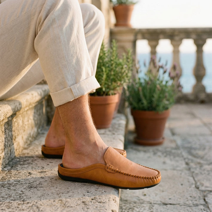 Cetara Leather Mules — Tan, coastal terrace with lavender
