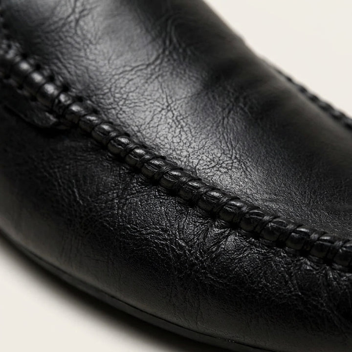Cetara Leather Mules — Black, close-up of hand-stitched moccasin seam