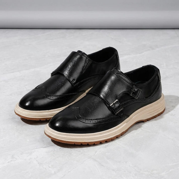 Gradara Leather Monk Shoes — Black, pair three-quarter studio view