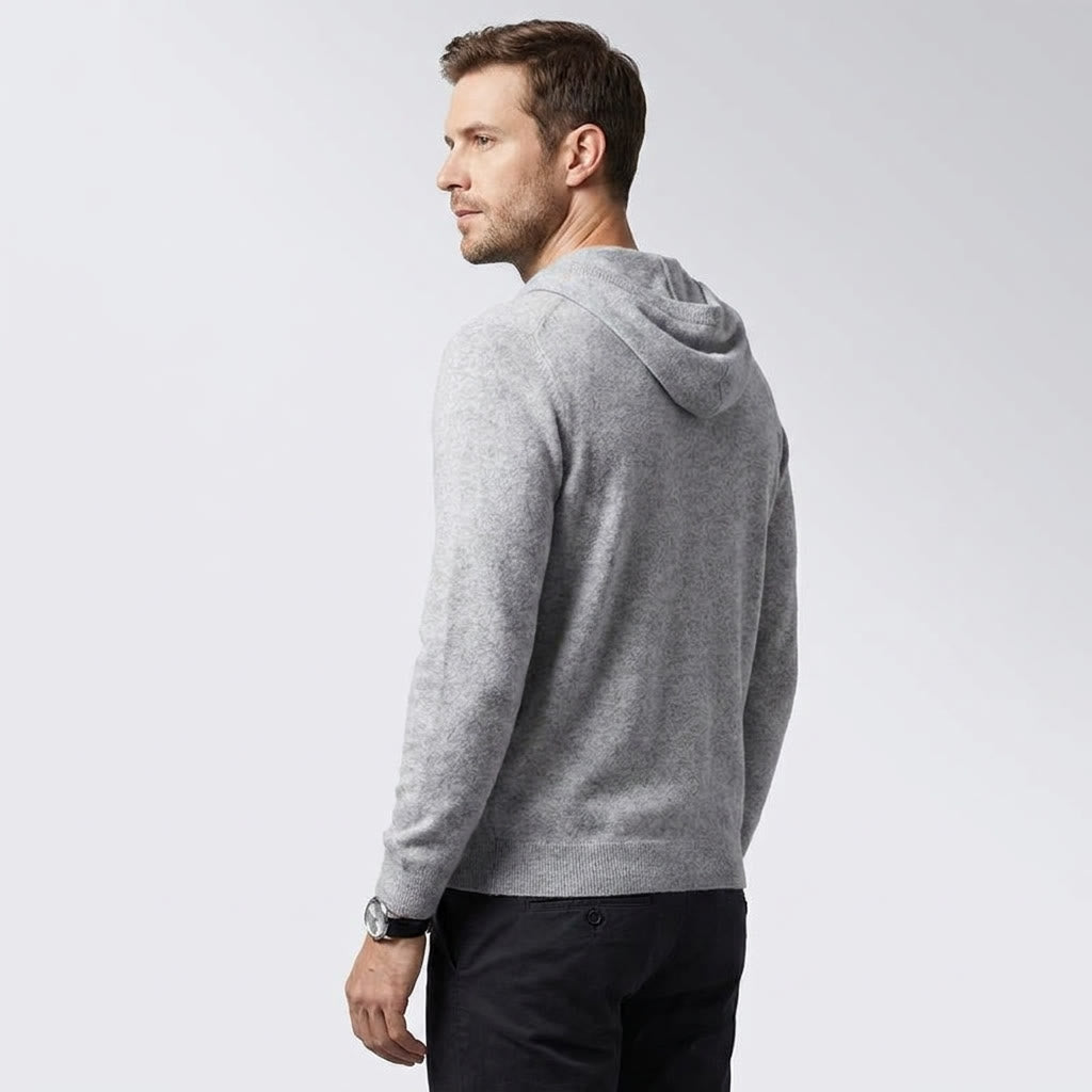 Nomad Merino Wool Hoodie — Grey, three-quarter back on millennial model