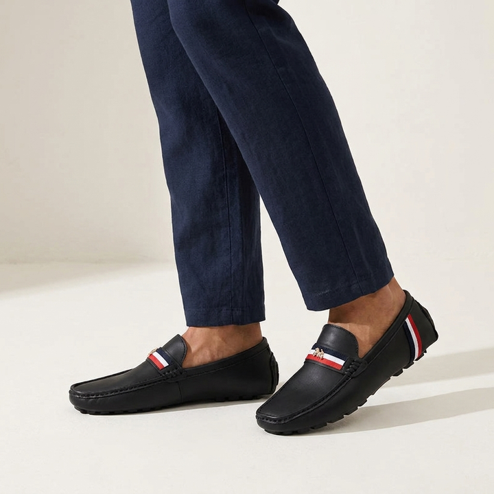Gaeta Stripe Loafers — Black, worn on model, studio