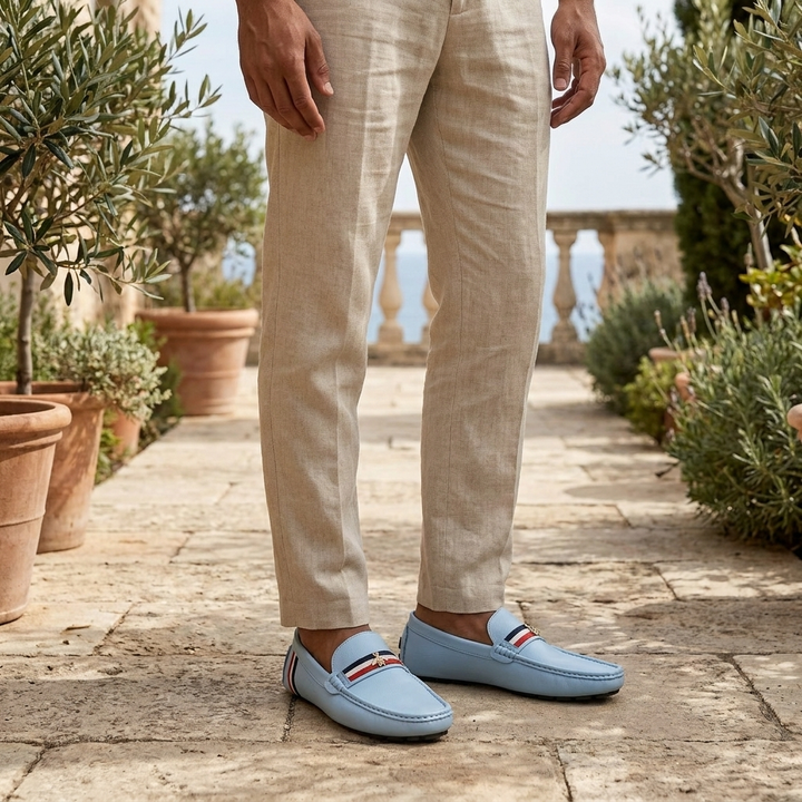 Gaeta Stripe Loafers — Powder Blue, worn on model, coastal terrace